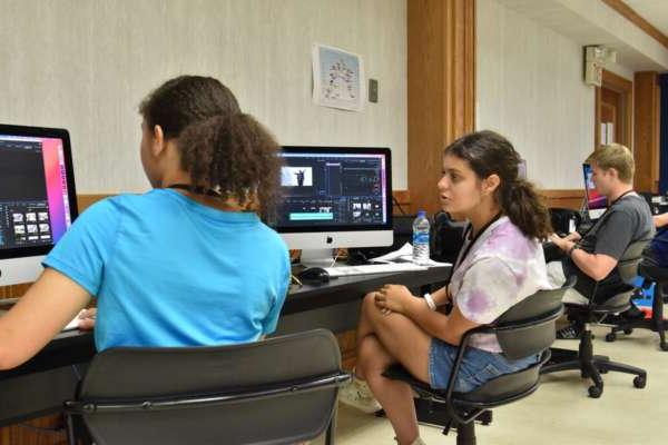 Students editing photos on computers