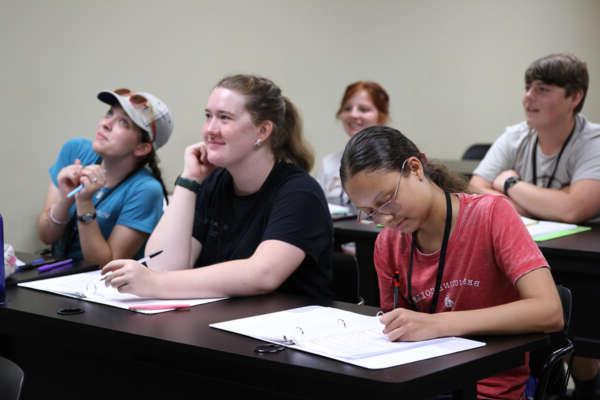 students taking notes in a lecture